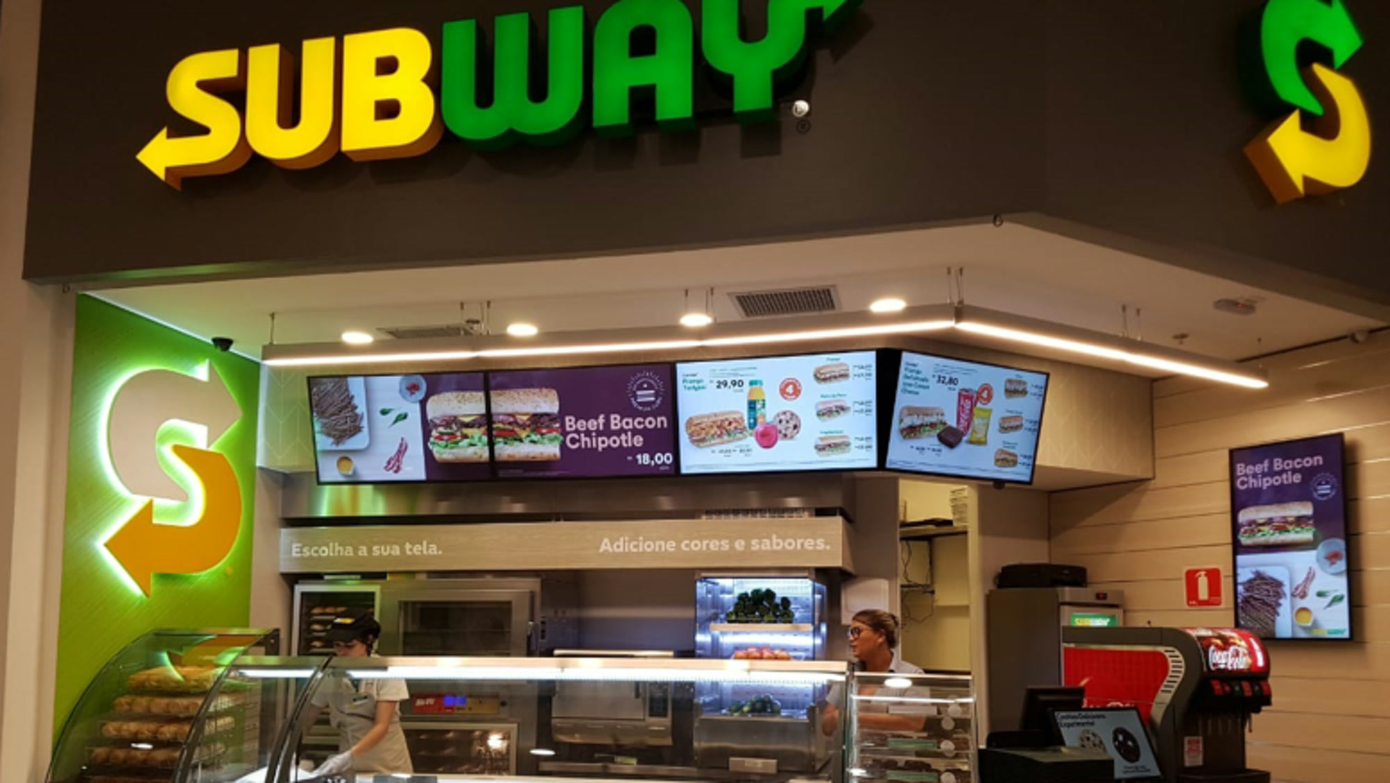 Subway restaurant with horizontal and portrait digital menu boards